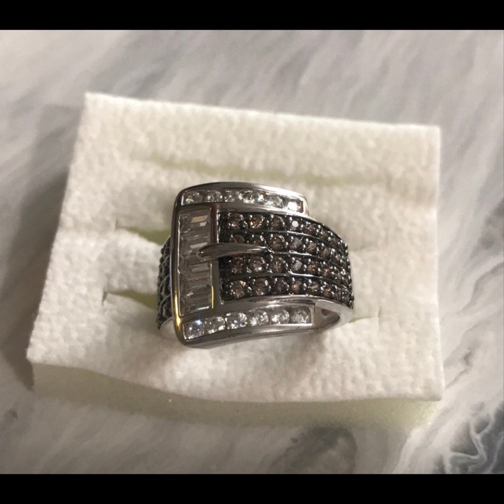 Beautiful Buckle Ring Sterling Silver with CZ’s. Will be sent in a velvet bag.